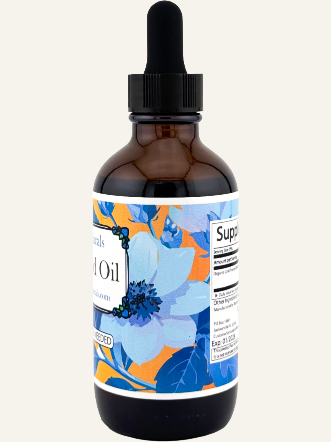 black seed oil bottle side view showing blue floral label design and supplement facts panel