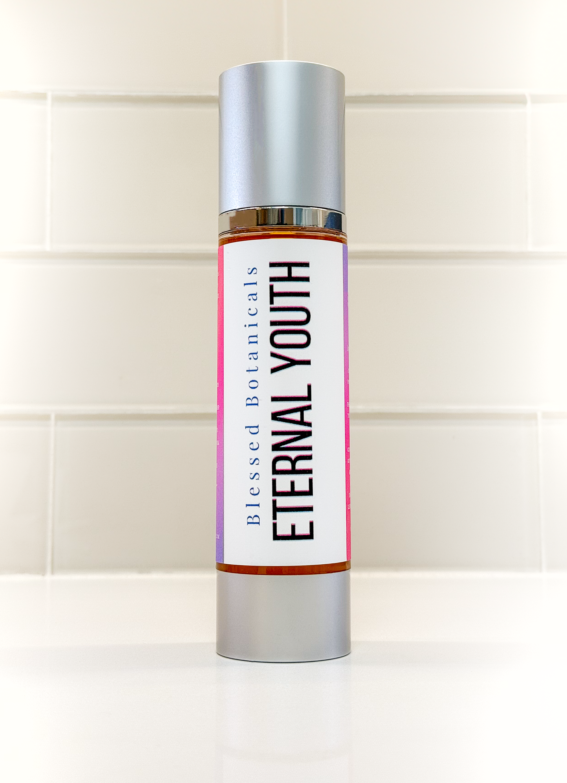 Blessed Botanicals Eternal Youth face oil bottle on bathroom counter for daily skincare routine