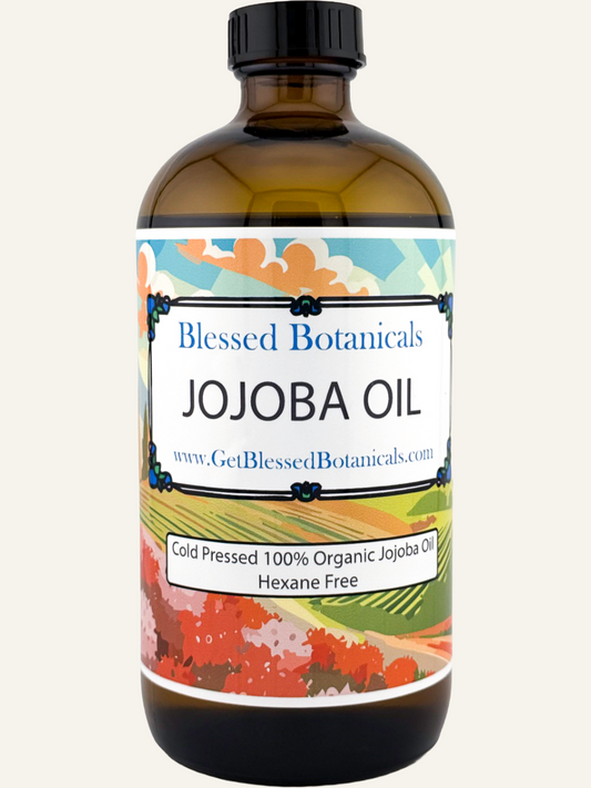 Blessed Botanicals cold pressed jojoba oil in amber glass bottle for skin and hair
